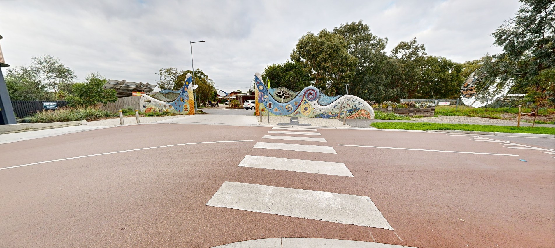 After: A view of Stewart Street looking towards the entrance of Ceres after the upgrades. A raised bit of road has been added with a zebra crossing.