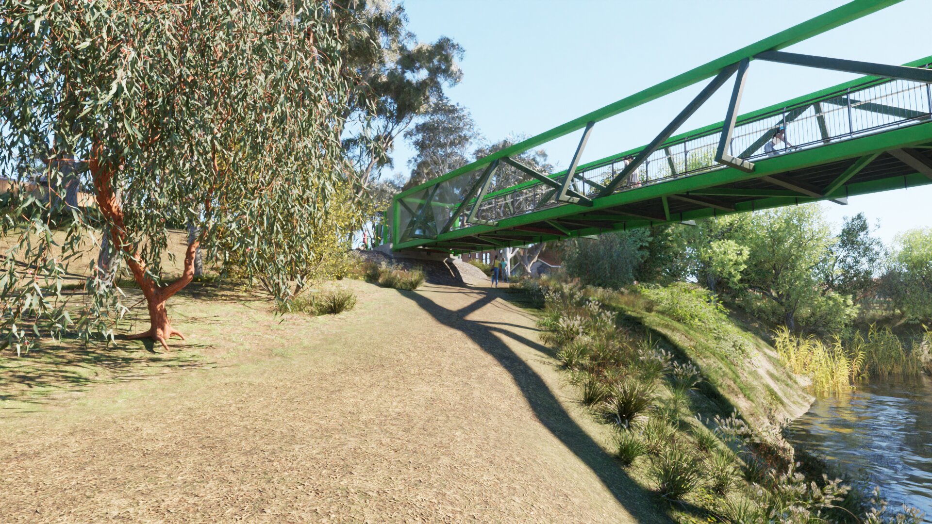 A low, modern looking, bridge extends from out of frame onto a grassy hill. There are trees around the entrance ot the bridge and the strucural beams are green.