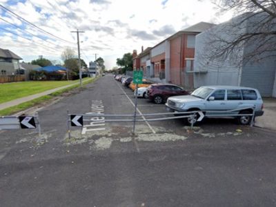 Parking lot at The Avenue and De Carle Street 