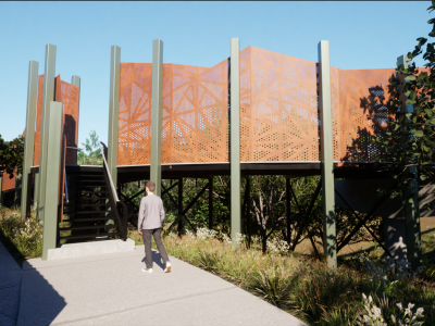 A computer generated image of the stairway up to the bridge. The stairs are black metal and lead up to a walkway that has rust coloured panels along the sides. To the left is the pathway to the ramp that leads to the bridge.