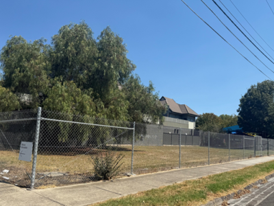 Current vacant lot at The Avenue and De Carle St. 